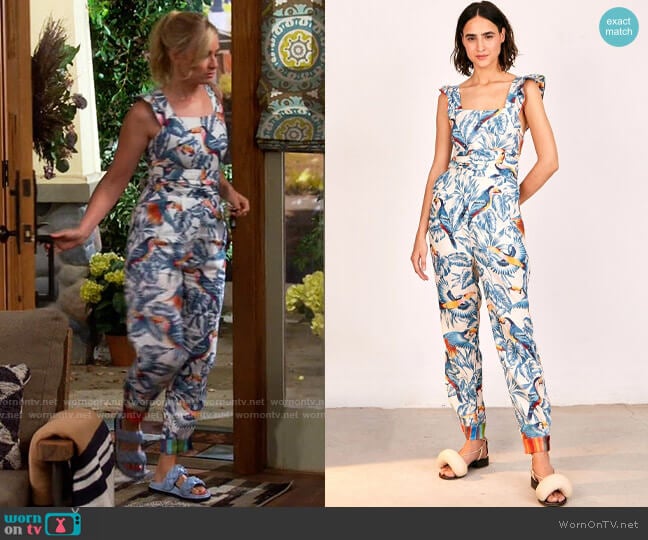 Farm Rio Flying Toucans Crossed Back Frilled Jumpsuit worn by Gemma (Beth Behrs) on The Neighborhood