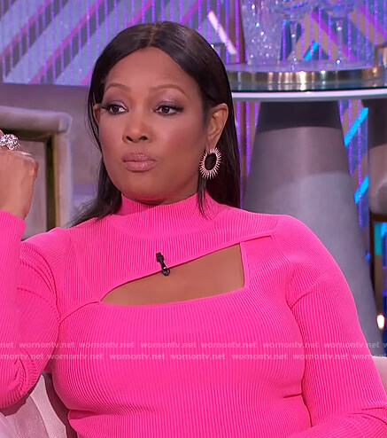 Garcelle’s pink ribbed cutout top on The Real