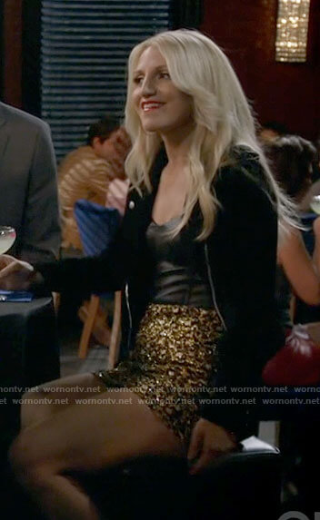 Gina's leather bustier and gold skirt on B Positive