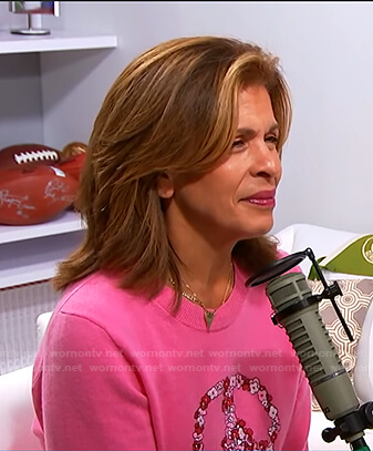 Hoda’s pink floral peace sweater on Today