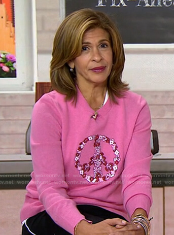 Hoda’s pink floral peace sweater on Today