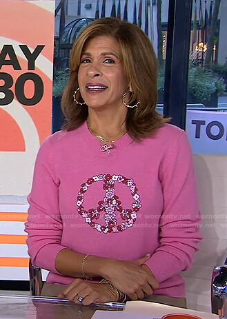 Hoda’s pink floral peace sweater on Today