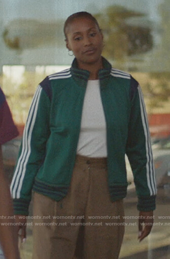 Issa's green Adidas track jacket on Insecure
