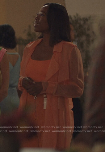 Molly’s orange zip pants on Insecure