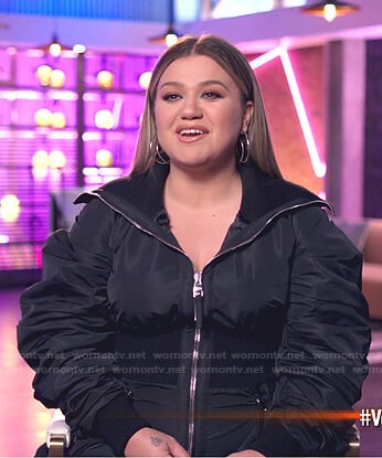 Kelly's black bomber mini dress on The Voice