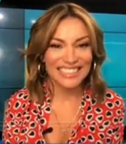 Kit's red heart print button down shirt on Access Hollywood