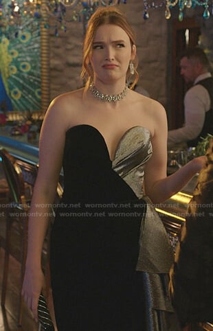 Kirby’s black and silver strapless ruffled dress on Dynasty