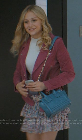 Lexy's pink suede jacket and floral skirt on Chucky