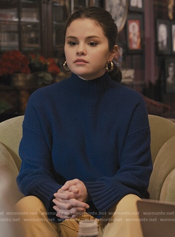 Mabel’s mini hoop earrings and boots on Only Murders in the Building