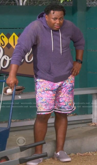 Marty's blue hoodie and pink marbled print shorts on The Neighborhood