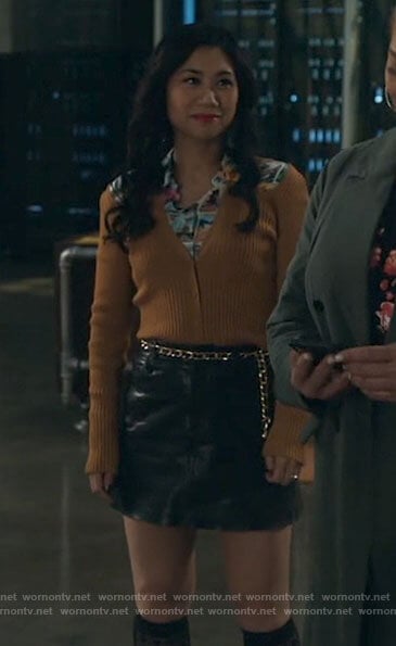 Mel's postcard print shirt and cardigan with cutout shoulders on The Equalizer