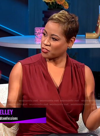 Monique’s red sleeveless wrap top on E! News Nightly Pop