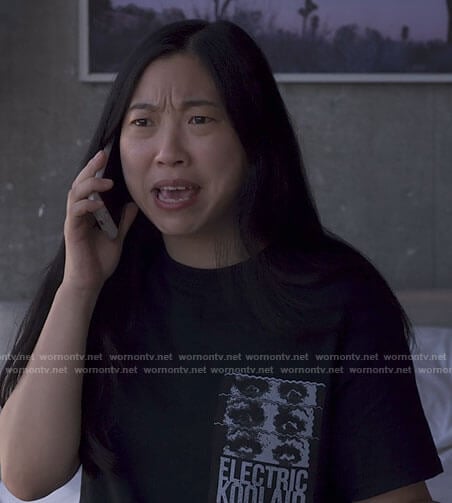 Nora's black Electric Koolaid t-shirt on Awkwafina is Nora From Queens