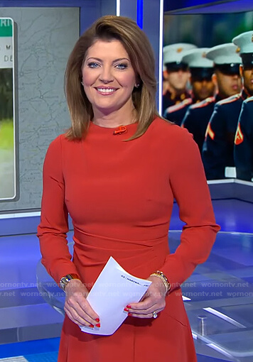 Norah’s orange gathered waist midi dress on CBS Evening News