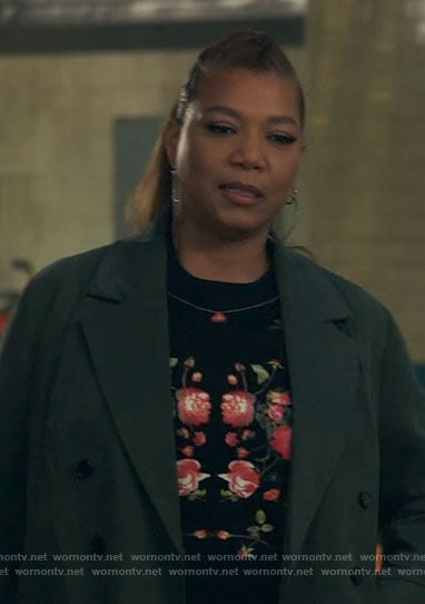 Robyn's black floral sweater on The Equalizer