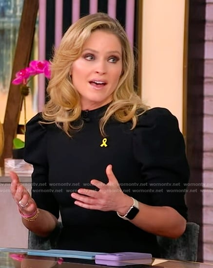 Sunny's black bow front jumpsuit on The View