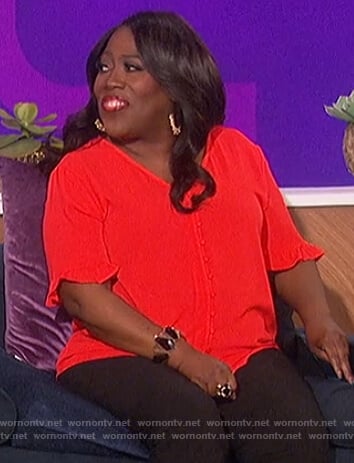 Sheryl’s red button down blouse on The Talk