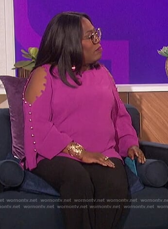 Sheryl’s purple button sleeve detail top on The Talk