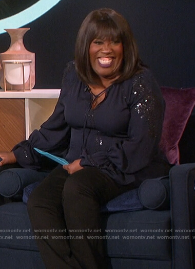 Sheryl’s blue tassel embellished blouse on The Talk