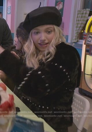 Stacey’s black fur pearl embellished jacket on The Baby-Sitters Club