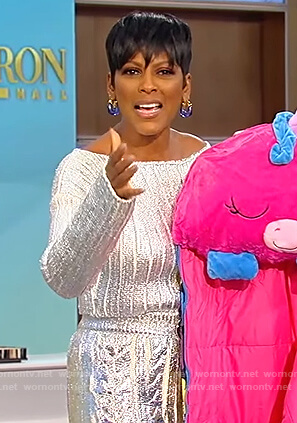 Tamron’s silver metallic sweater and skirt on Tamron Hall Show