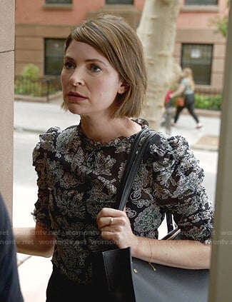 Taylor’s black floral top on Bull