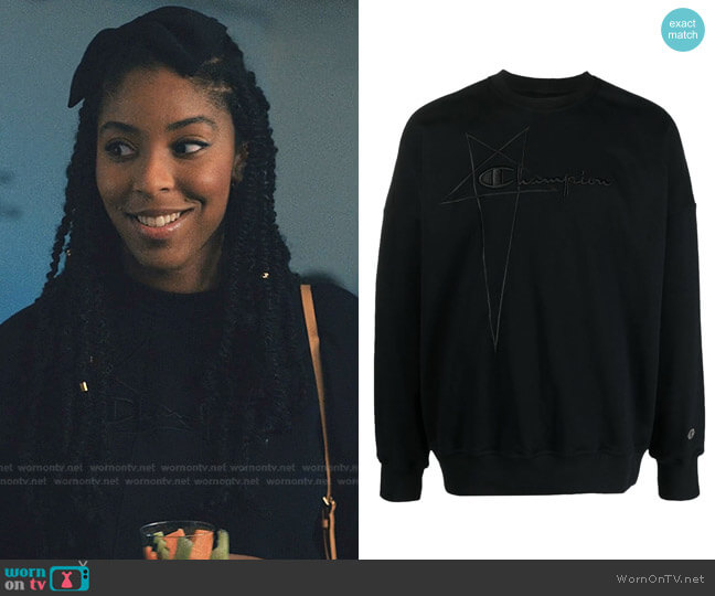 Mia’s black embroidered sweatshirt on Love Life