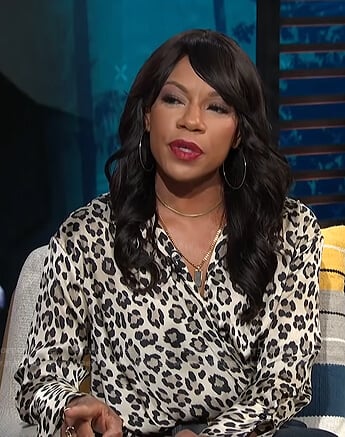 Wendy Raquel Robinson’s grey leopard print blouse on E! News Daily Pop