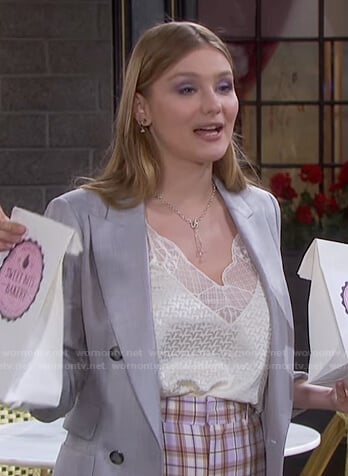 Allie’s white lace top and lilac plaid pants on Days of our Lives