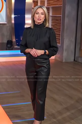 Amy’s black mock neck blouse and leather pants on Good Morning America