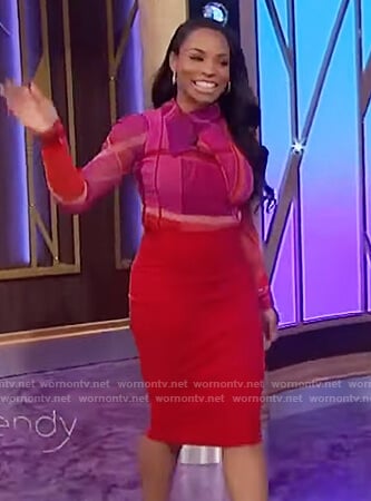 Devyn Simone's pink plaid wrap top on The Wendy Williams Show