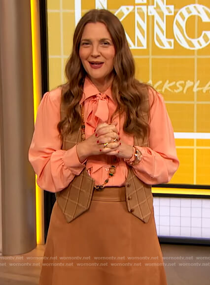 Drew’s coral tie neck blouse on The Drew Barrymore Show