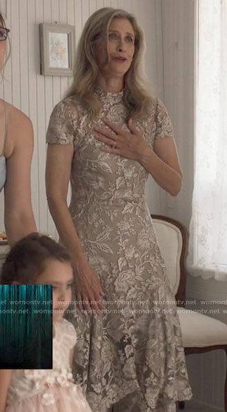 Eliza's champagne lace dress on Supergirl