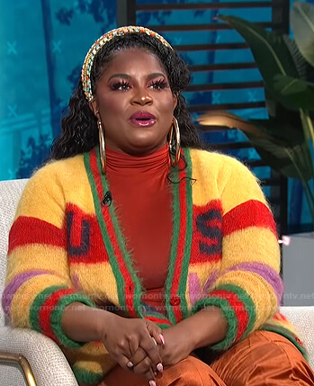 Ester Dean’s yellow printed mohair cardigan on E! News Daily Pop