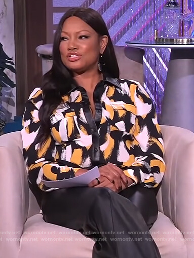 Garcelle's printed blouse with leather trim on The Real