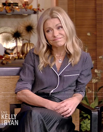 Kelly’s black striped shirt and pleated skirt on Live with Kelly and Ryan