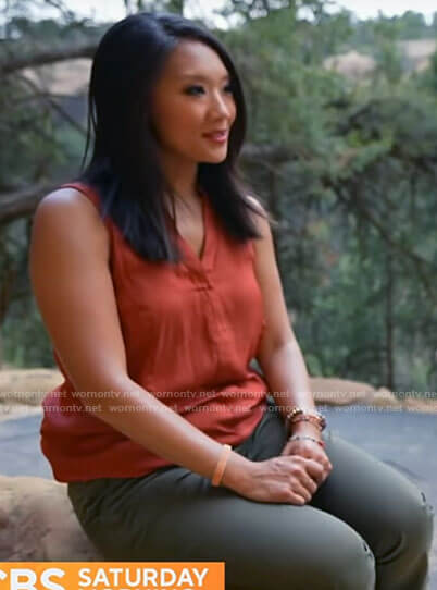 Nancy Chen's orange sleeveless top on CBS Saturday Morning