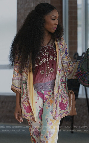 Naomi's embroidered cardigan and pants on Queens