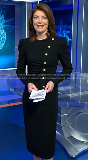 Norah’s black button embellished dress on CBS Evening News