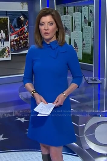 Norah's blue bow neck shift dress on CBS Evening News