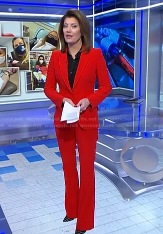Norah’s red suit on CBS Evening News