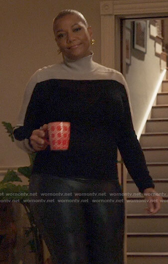 Robyn's black colorblock sweater on The Equalizer