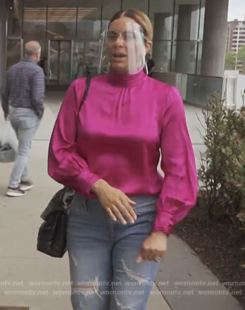 Ashley's pink satin blouse on The Real Housewives of Potomac
