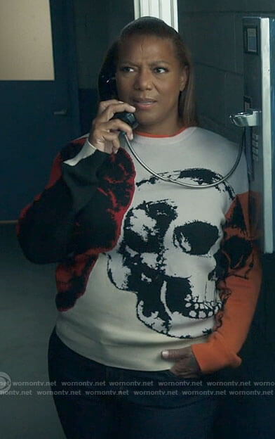Robyn's skull graphic sweater on The Equalizer