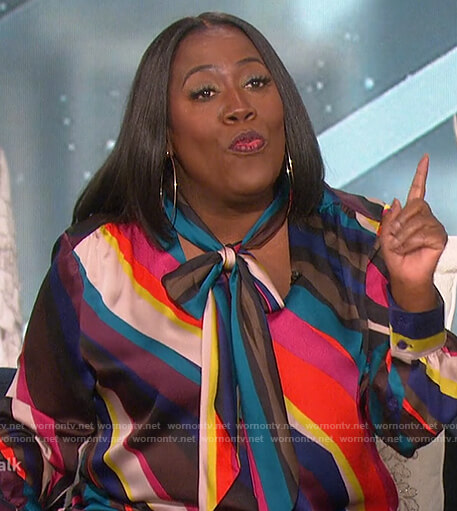 Sheryl’s rainbow stripe tie neck blouse on The Talk