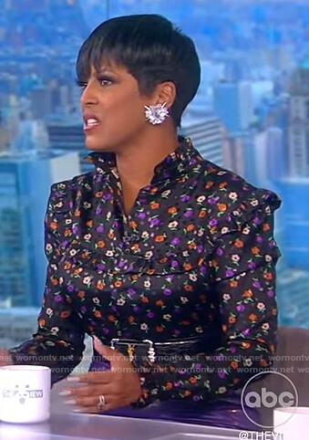 Tamron’s black floral print ruffle blouse on The View