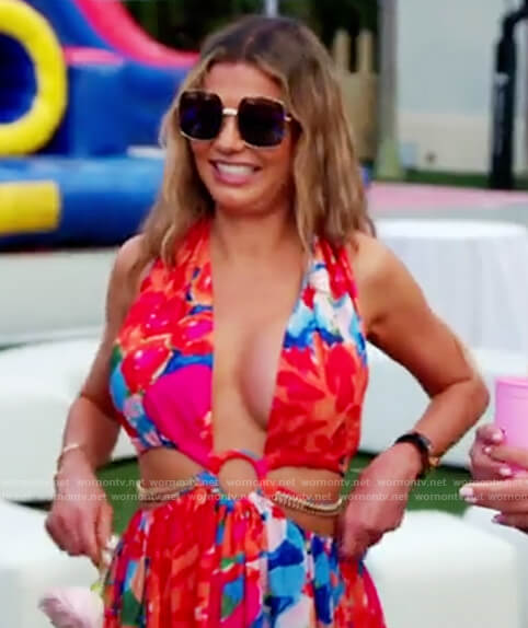 Adriana de Moura’s red floral print cutout dress on The Real Housewives of Miami