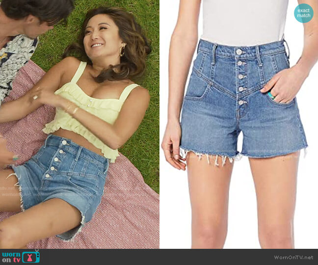 High-Waist Frayed Cutoff Shorts by Mother worn by Mindy Chen (Ashley Park) on Emily in Paris