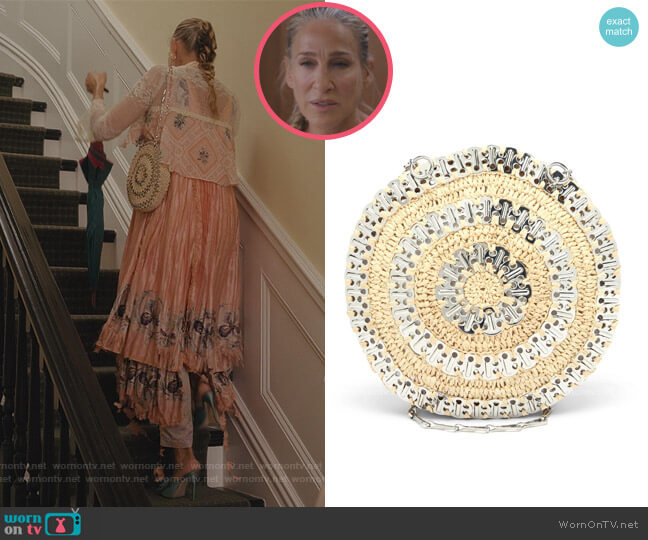 Circle Rabanne raffia shoulder bag by Paco Rabanne worn by Carrie Bradshaw (Sarah Jessica Parker) on And Just Like That