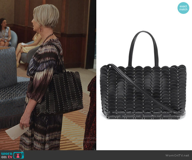 Pacoio disc-embellished tote by Paco Rabanne worn by Miranda Hobbs (Cynthia Nixon) on And Just Like That